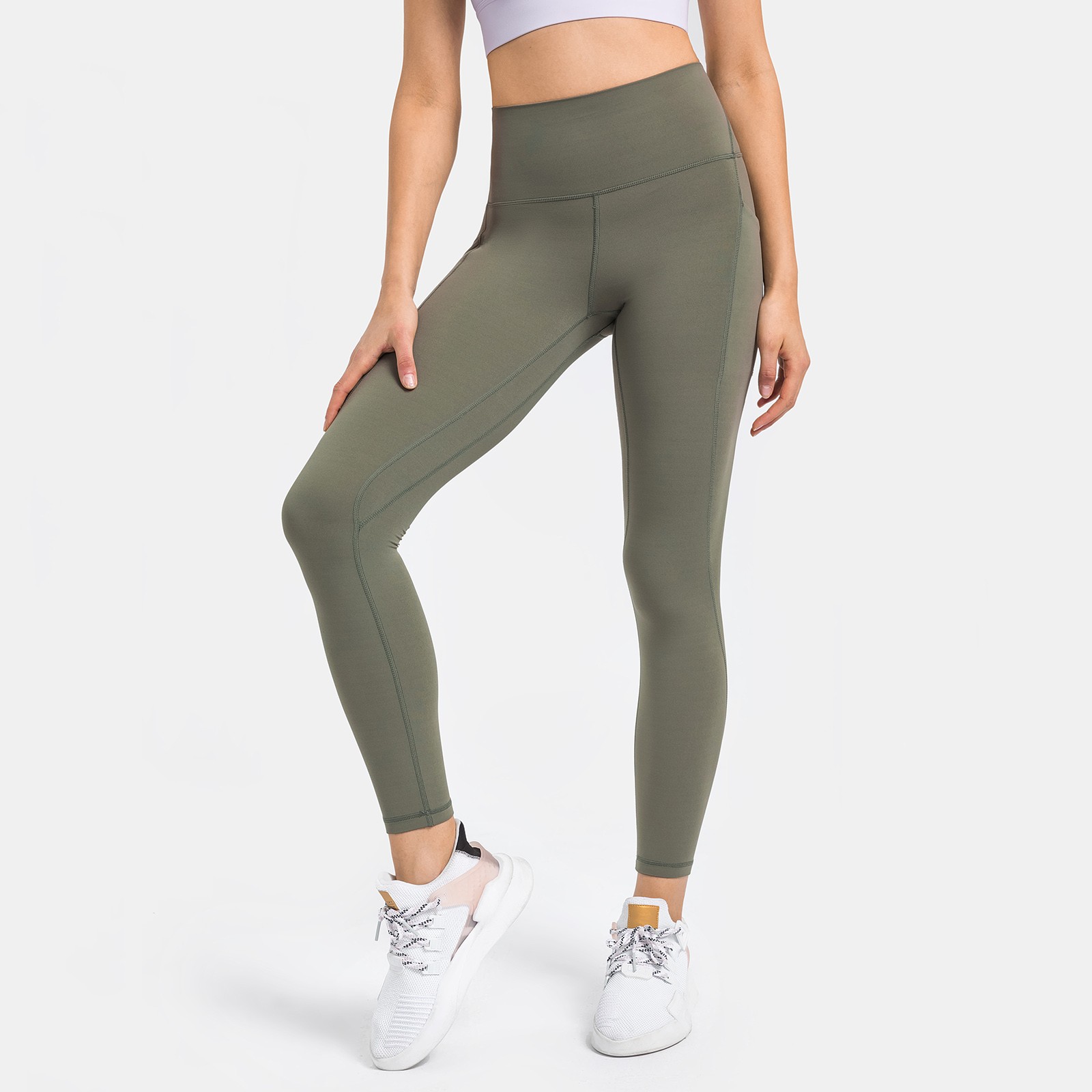 thumbnail image 2 of Pantalones de yoga de alto rendimiento con bolsillos laterales: leggings deportivos, nailon y spandex, ajuste ceñido y sujeción., 2 of 8